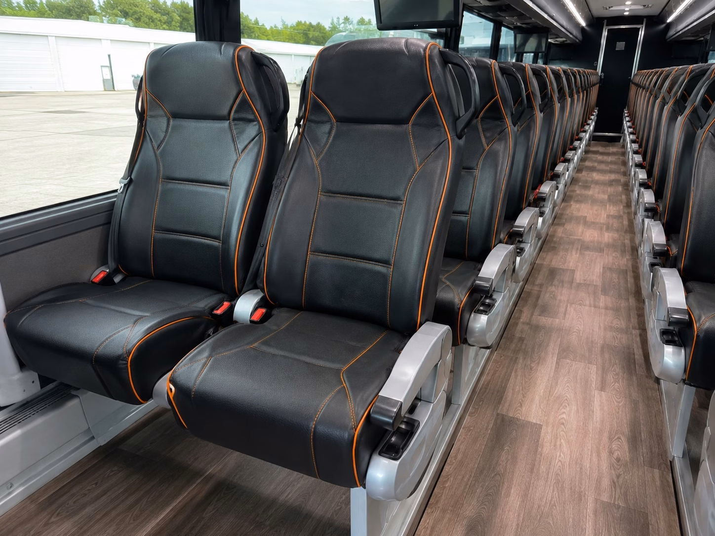uncg spartans and guilford college fan shuttle bus rentals in greensboro